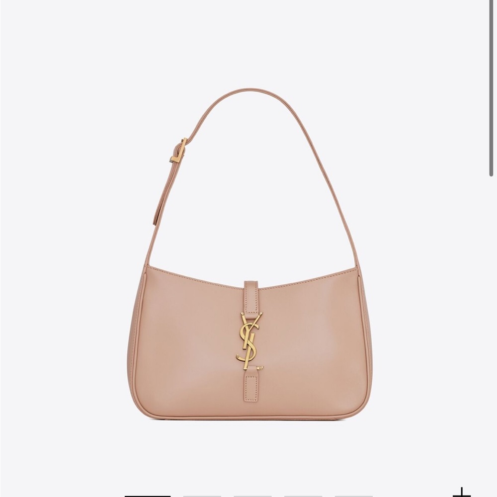 CASSANDRE HOBO BAG FEATURING A CASSANDRE HOOK CLOSURE.